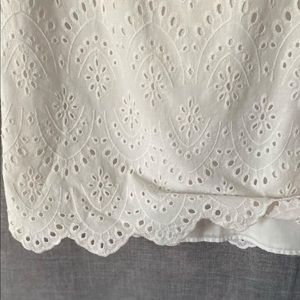 White eyelet dress with scalloped hem